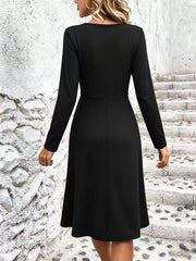 Surplice Long Sleeve Midi Dress in Black, close-up detail