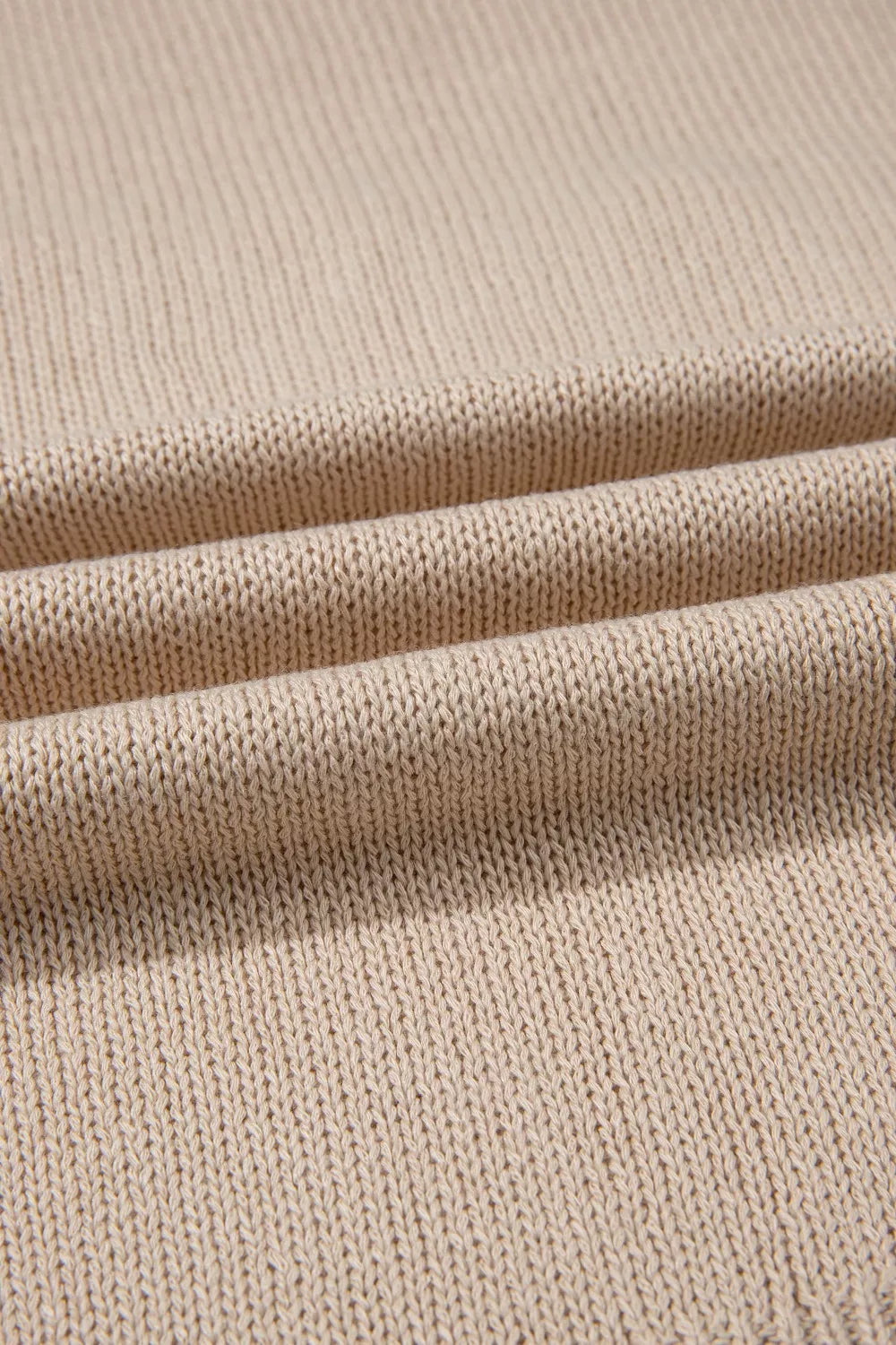 Howdy Textured Knit Sweater Vest in beige acrylic with a ribbed knit texture.