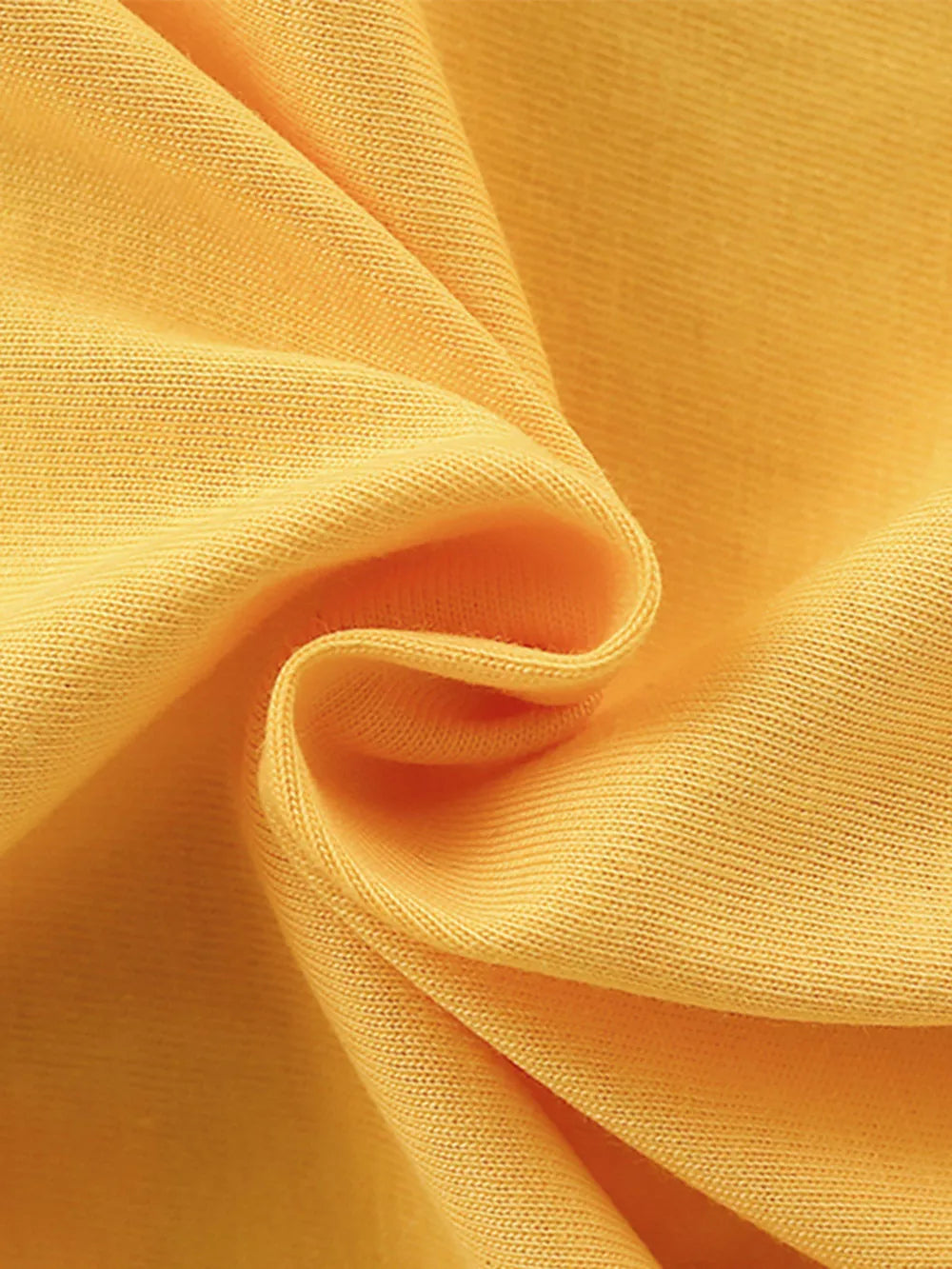 Yellow cotton t-shirt fabric detail