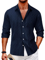Navy textured weave relaxed fit button-down shirt with long sleeves.
