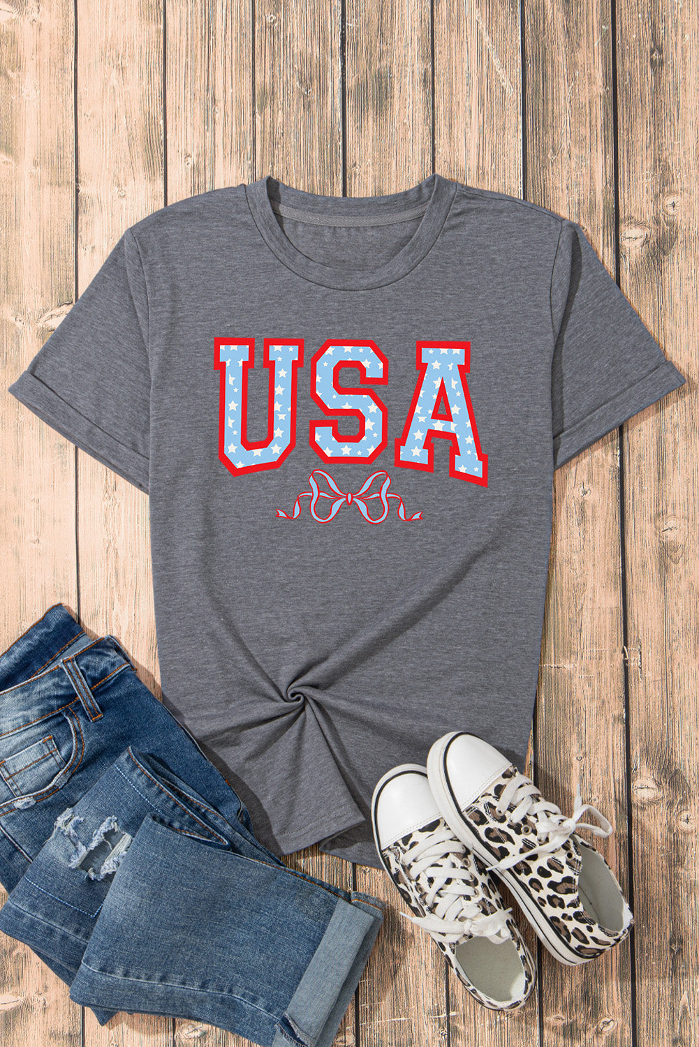Dark gray cotton tee with rolled sleeves and USA star graphic.