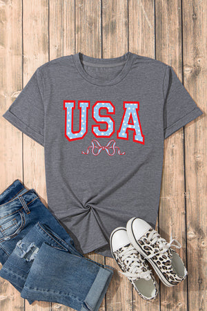 Dark gray cotton tee with rolled sleeves and USA star graphic.