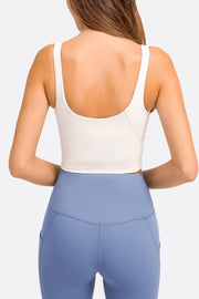 White scoop neck crop top with wide straps, shown from the back.