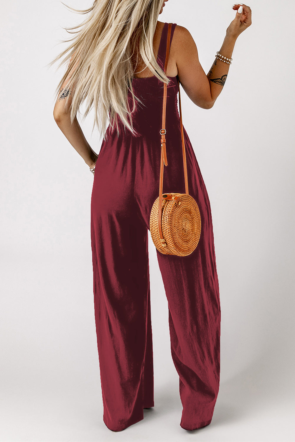 Wine Sway Square Smocked Jumpsuit with wide legs and a square neckline.