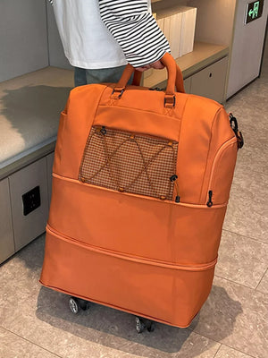 Orange large Oxford rolling travel bag with front mesh pocket and wheels