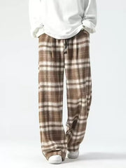 Brown plaid wide-leg sweatpants with drawstring waist and pockets.
