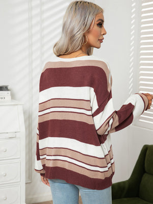 Acrylic V-neck sweater with wide wine, tan, and white stripes.