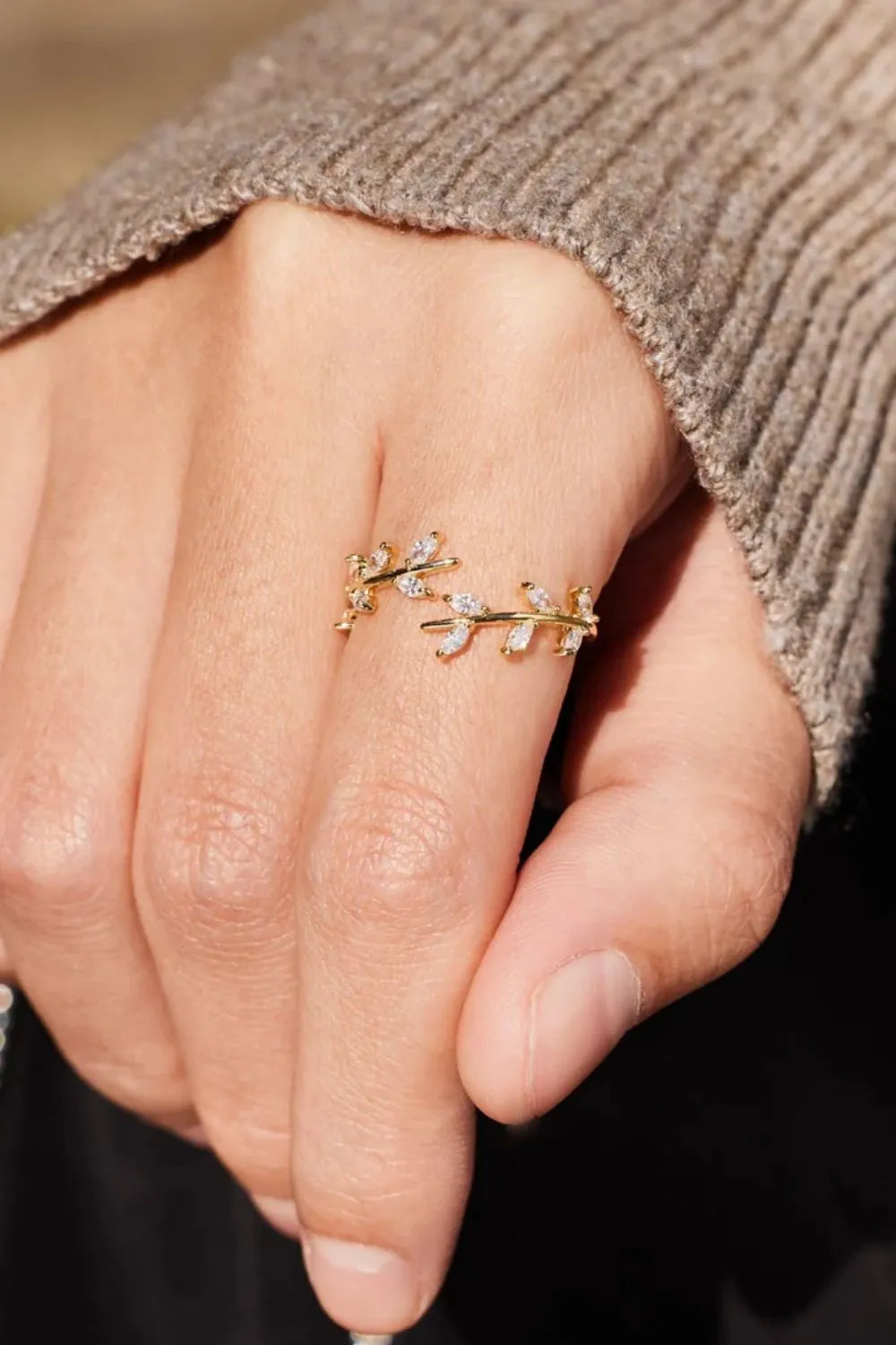 Gold branching foliage open ring with cubic zirconia accents