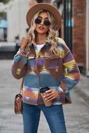 Southwestern print overshirt jacket in burgundy, tan, and blue with button front and chest pockets.