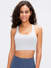 White performance bra with scoop neck and racerback detail
