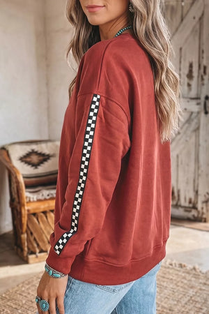 Checkered Trim Long Sleeve Round Neck Sweatshirt in Rust, close-up detail