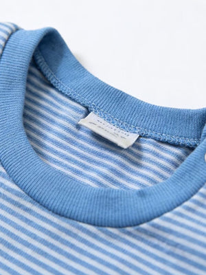 Blue and white striped baby bodysuit with a ribbed blue neckline and tag.