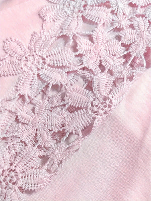 Blush pink blouse with delicate lace yoke and sleeve detail.
