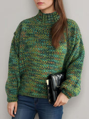 Textured mélange mock neck pullover sweater in dark green with a chunky knit and relaxed fit.