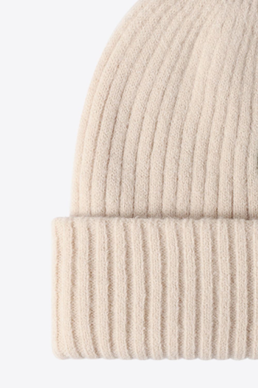 Beige ribbed acrylic beanie with folded cuff detail
