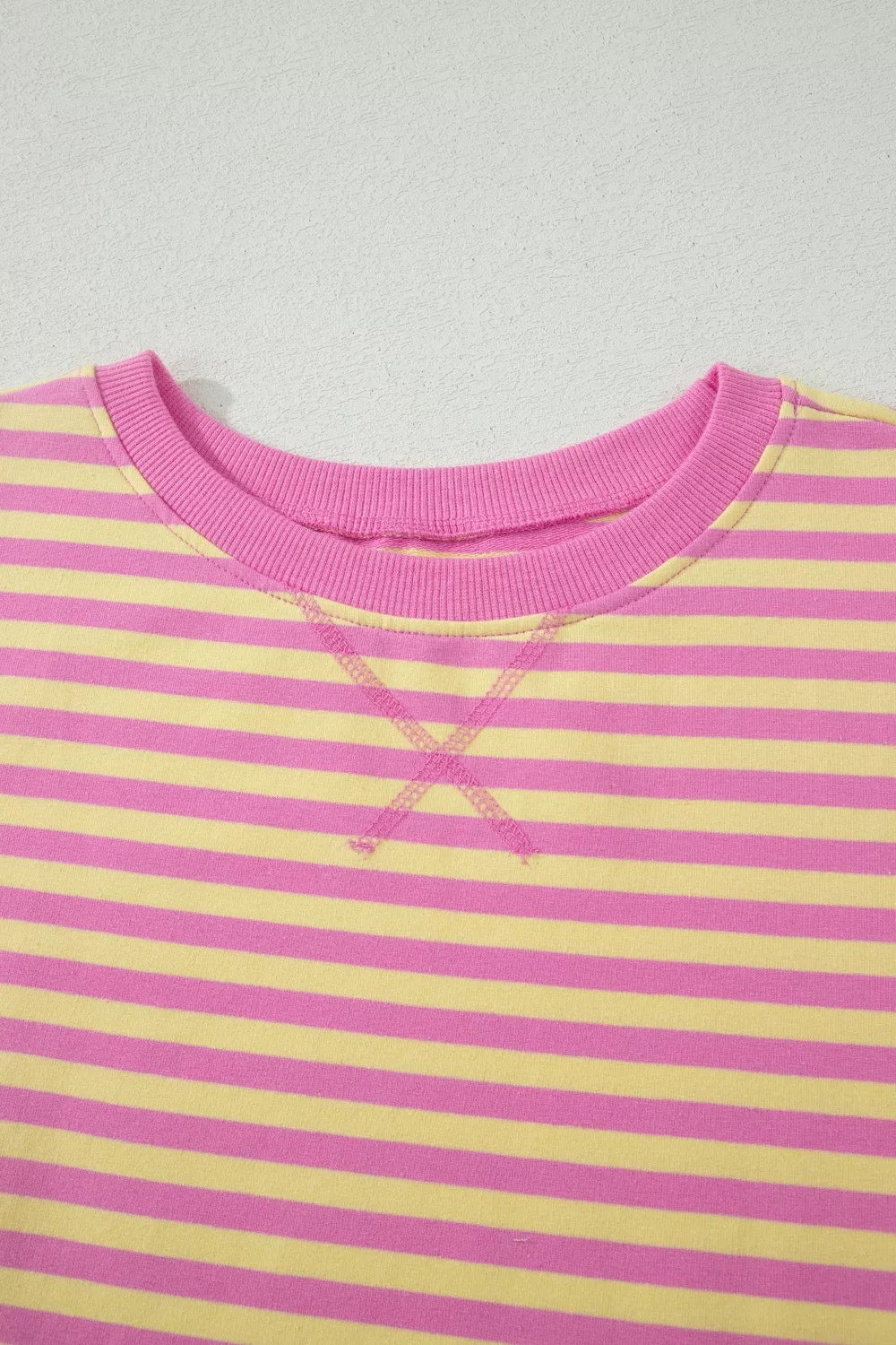 Pink and yellow striped cotton crewneck sweatshirt with X detail