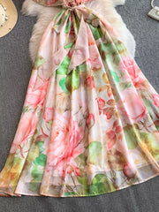 Botanical off-shoulder dress in light pink with a floral rose print and belted waist.