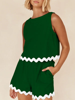 Dark green scalloped edge tank and shorts co-ord set with white trim.