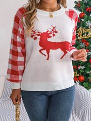 White sweater with red reindeer graphic and red gingham sleeves.