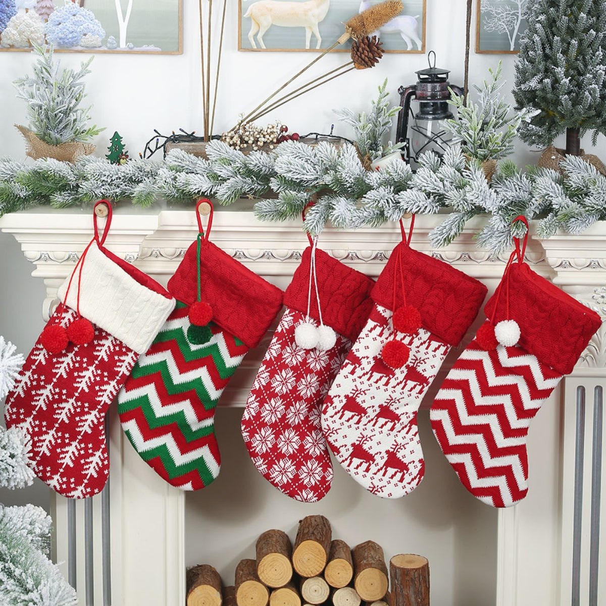 Festive knit Christmas stockings in red and white snowflake, red and green chevron, red and white reindeer, and red and