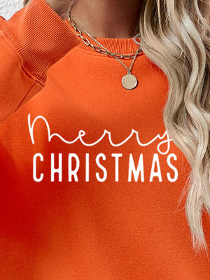 Orange Merry Christmas graphic sweatshirt with crewneck and long sleeves.