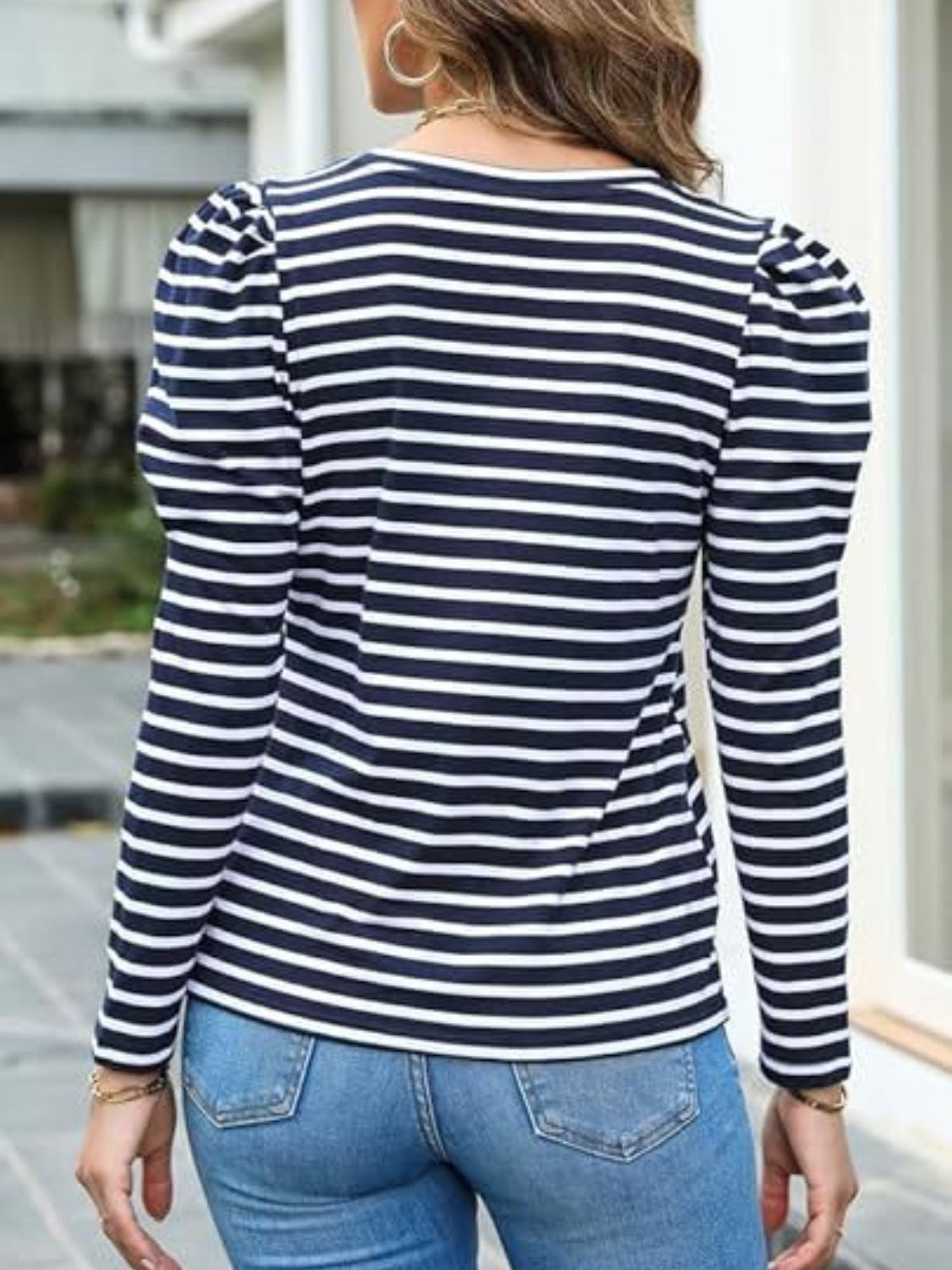 Navy and white striped tee with puff sleeves and a crew neck.