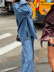 Blue striped button-up shirt and wide-leg pants set with side slits
