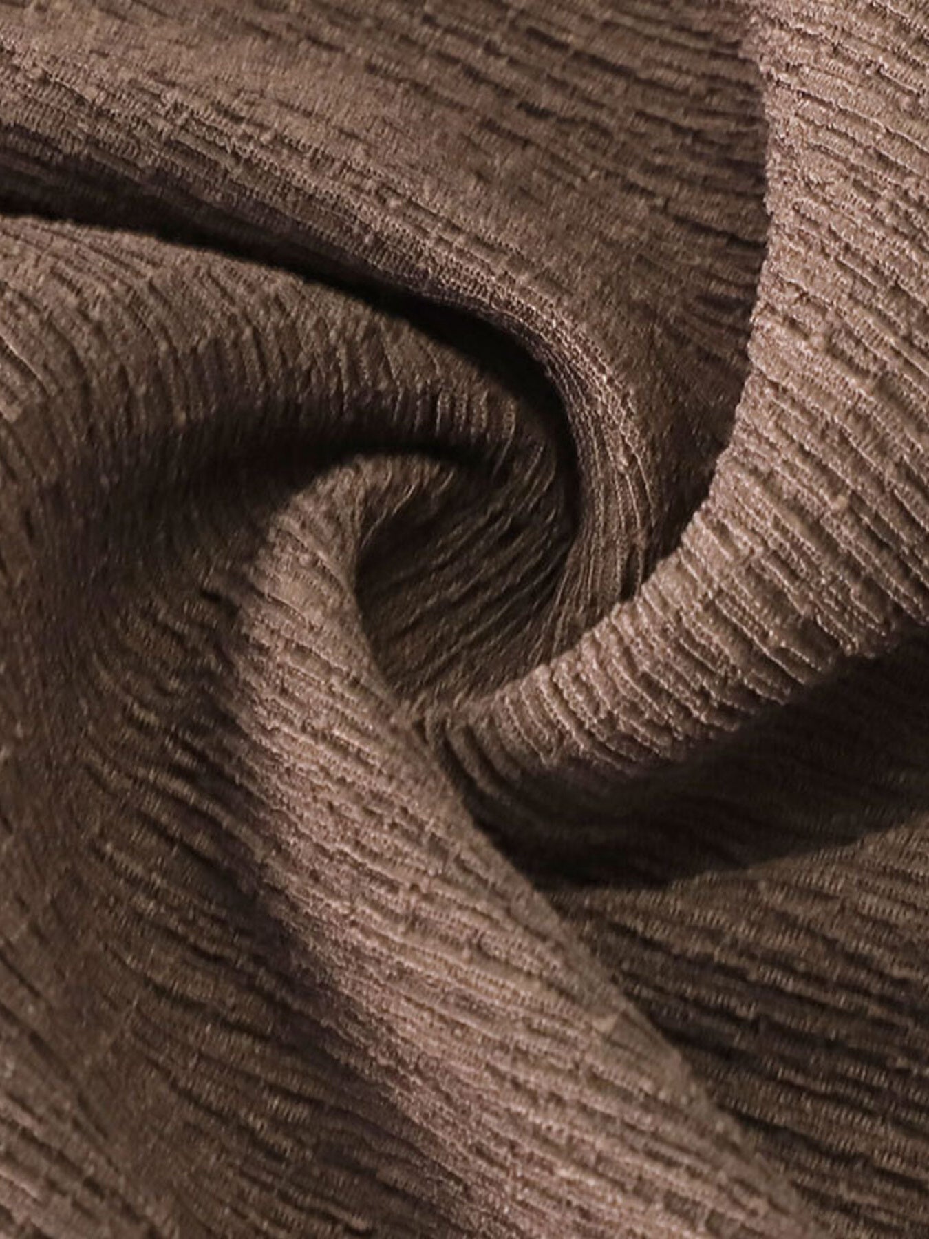 Brown crinkled wide-leg pants fabric detail