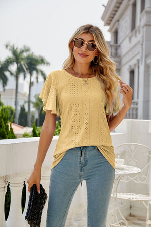 Yellow eyelet flounce sleeve crew neck blouse with intricate patterns.