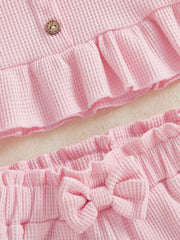 Pink waffle knit tank with ruffled hem and bow shorts set for baby girls.