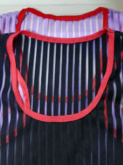 Black sheer stripe tank top with red trim and purple stripe underlayer.