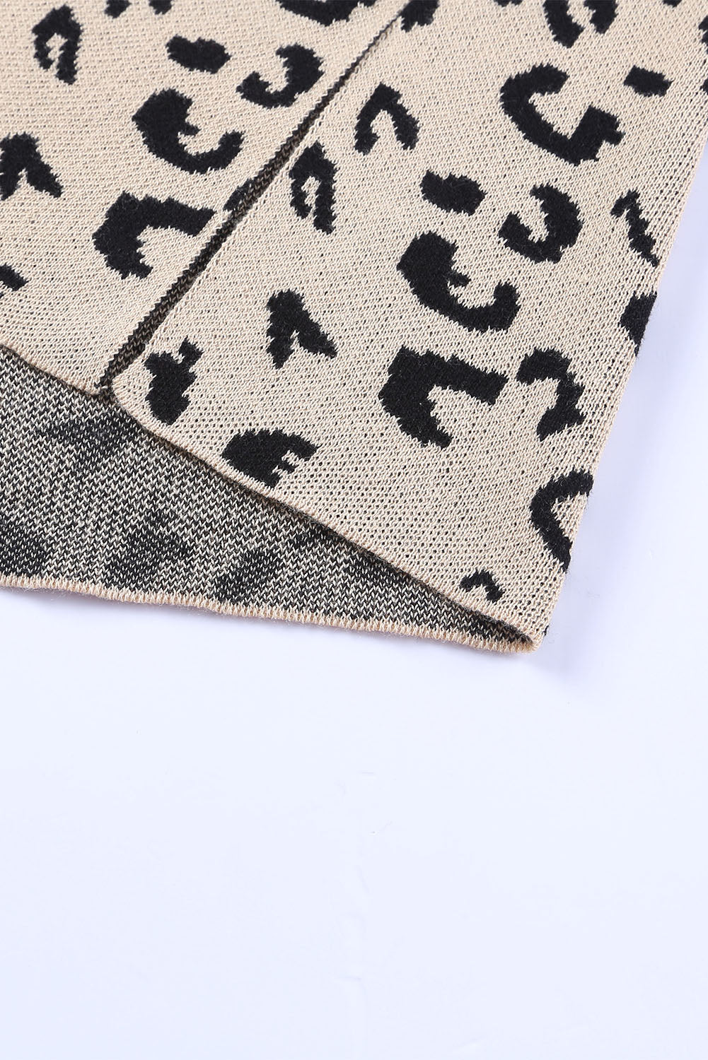 Khaki leopard print knit sweater with asymmetric panel detail