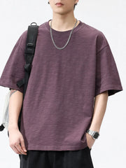 Relaxed fit plum purple cotton t-shirt with crew neck and short sleeves.