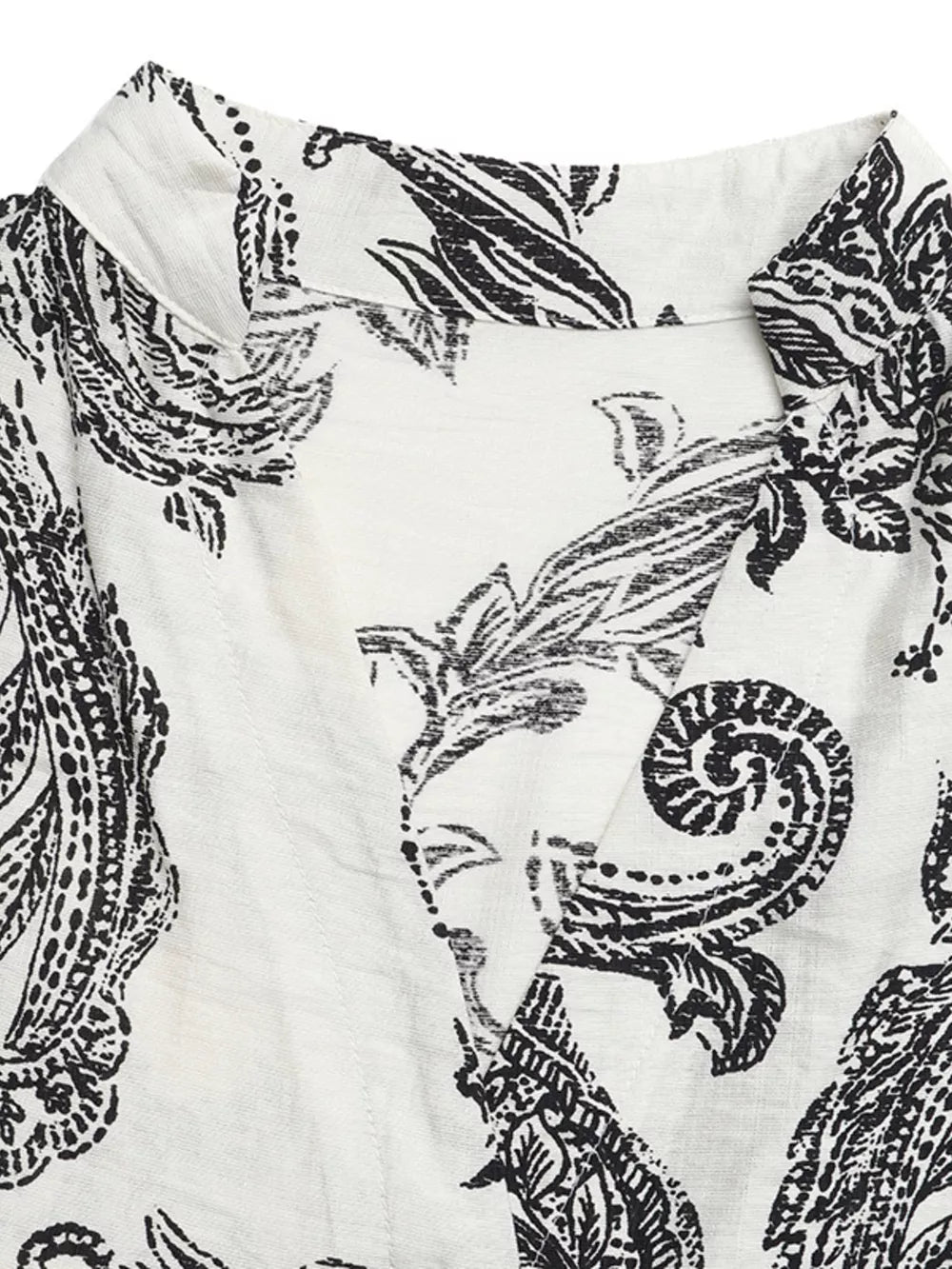 Paisley print maternity maxi dress with notched neckline and ruffles in black and white.
