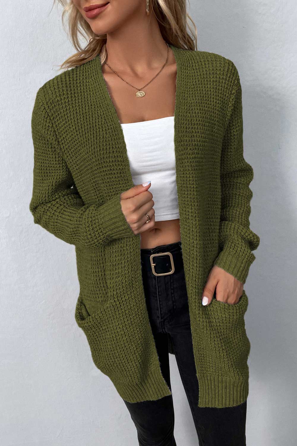 Matcha green waffle knit longline cardigan with pockets and open front.