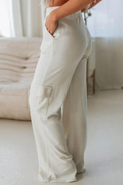 Ivory wide leg cargo pants with a side pocket detail.