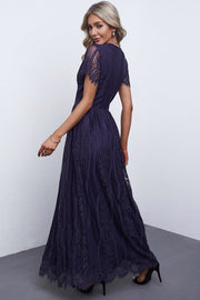 Navy lace midi dress with short sleeves, scalloped hem, and intricate lace overlay.