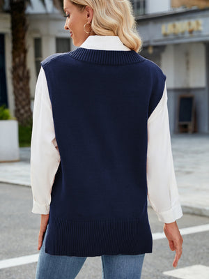 Dark Blue ribbed knit V-neck sweater vest with a white collared shirt and jeans.