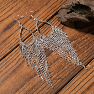 Crystal raindrop chandelier earrings with cascading rhinestones on alloy hooks.