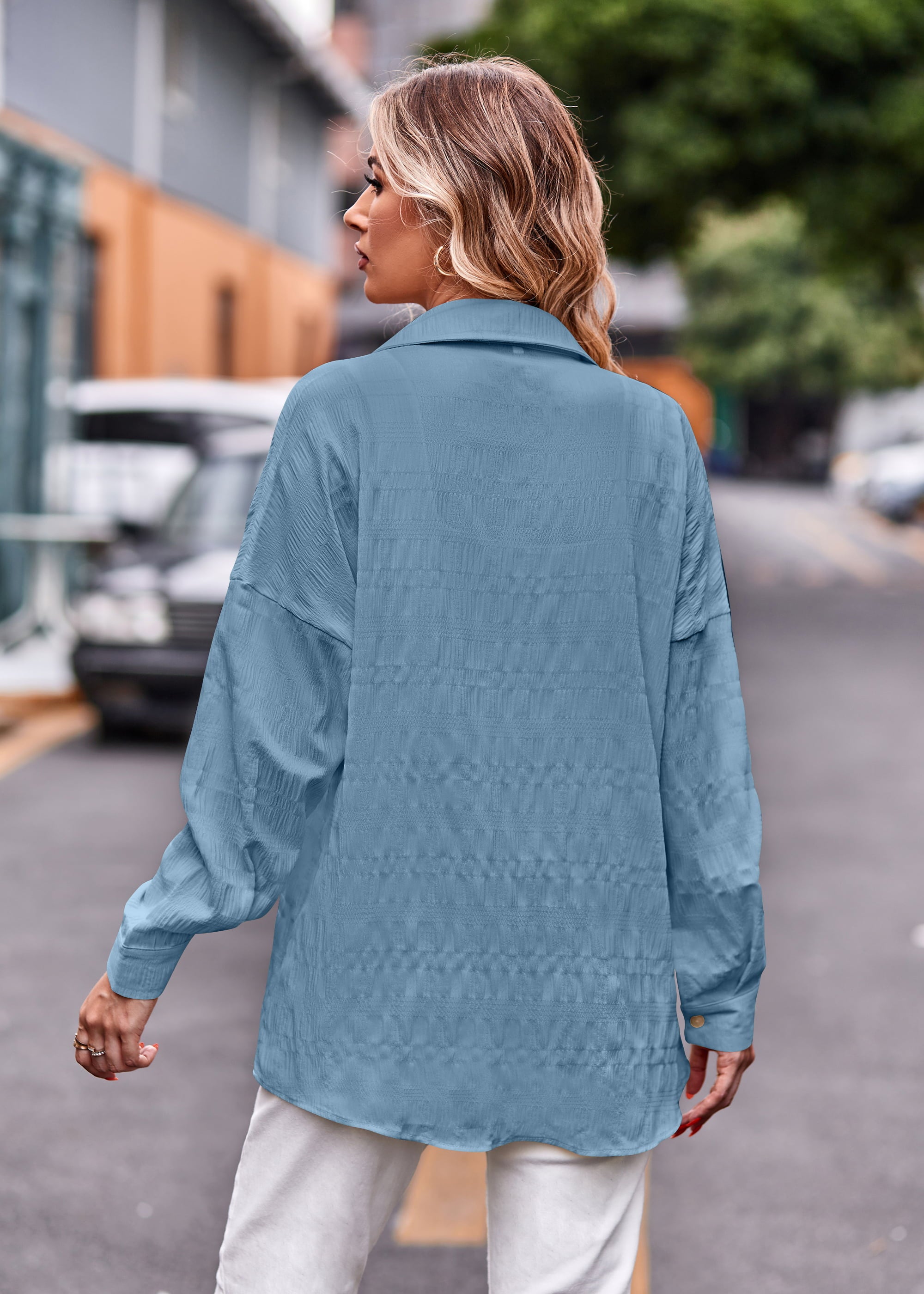Sky blue textured overshirt with relaxed fit and buttoned cuffs.
