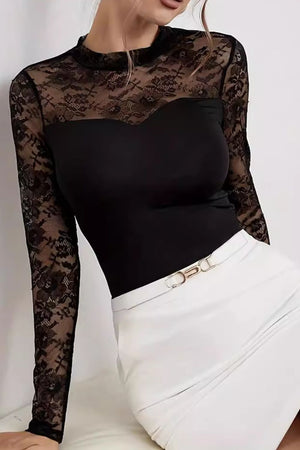 Black lace illusion bodysuit with sweetheart neckline and long sleeves.