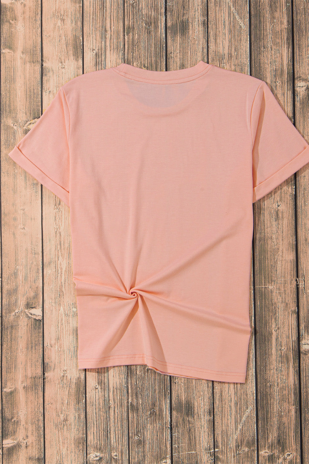 Watermelon pink t-shirt with cuffed sleeves and a twisted hem detail.