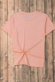 Watermelon pink t-shirt with cuffed sleeves and a twisted hem detail.