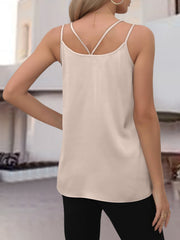 Tan satin camisole with crisscross back straps