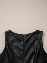 Black vegan leather sleeveless mini dress with a back zipper detail.