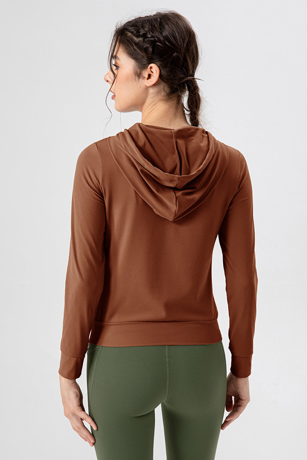 Brown performance fit hoodie with long sleeves and a hood, shown from the back.
