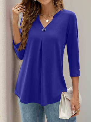 Pleated V-neck three-quarter sleeve top in Violet with a decorative button detail.