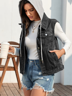 Black denim vest with hood detail and buttoned front, styled with ripped denim shorts.