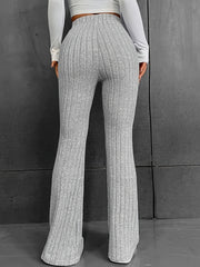 Gray ribbed flare trousers in 100% polyester with a high waist.