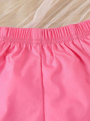 Bright pink baby shorts with elastic waistband and ruffled trim detail.